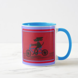 perro en una taza del campanero de la bici