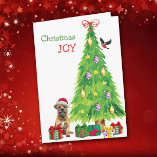 Perro fronterizo, pájaro y árbol de Navidad