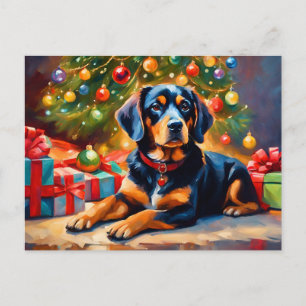 Perro lindo por el árbol de Navidad