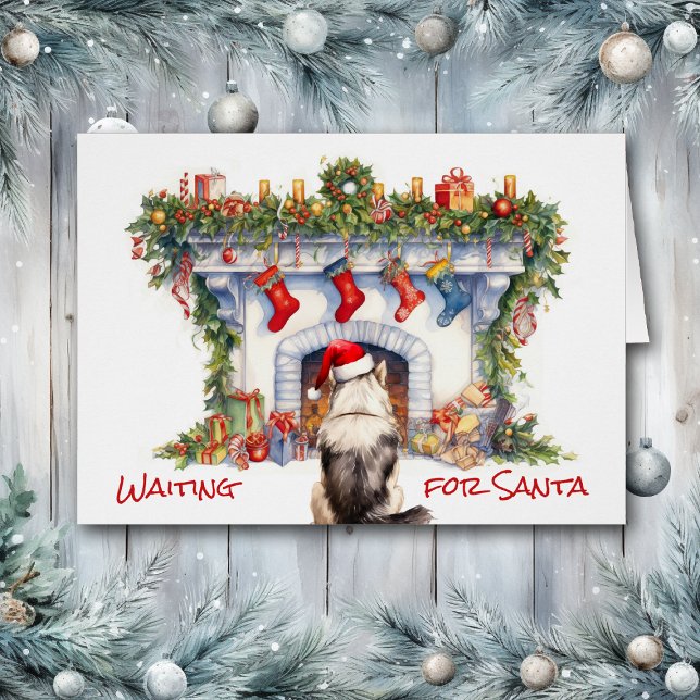 Perro malamuta espera a la chimenea de Santa Navid (Subido por el creador)