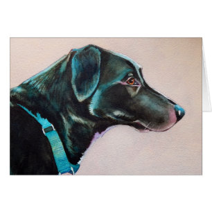 Perro negro pensivo