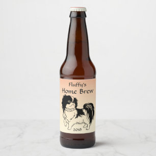 Perro negro y blanco en etiqueta de cerveza Naranj