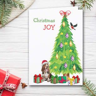 Perro, pájaro y árbol de Navidad astronados