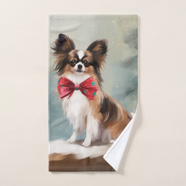 Perro Papillon en Navidad con nieve  (Toalla de mano)
