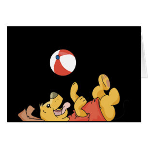 Perro que juega con las camisetas y los regalos de