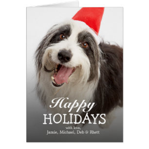 Perro que lleva el gorra de Santa