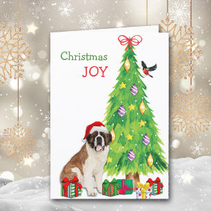 Perro Santa Hat Saint Bernard y árbol de Navidad