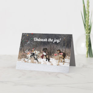 Perros de tarjetas de vacaciones felices