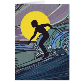 Persona que practica surf de la noche