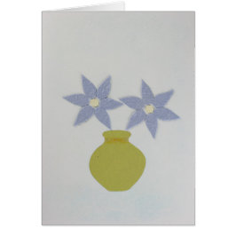 Personaliza el jarrón verde y dos flores azules