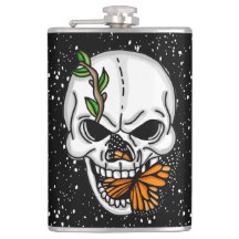 Calavera con fondo negro de mariposas monarcas
