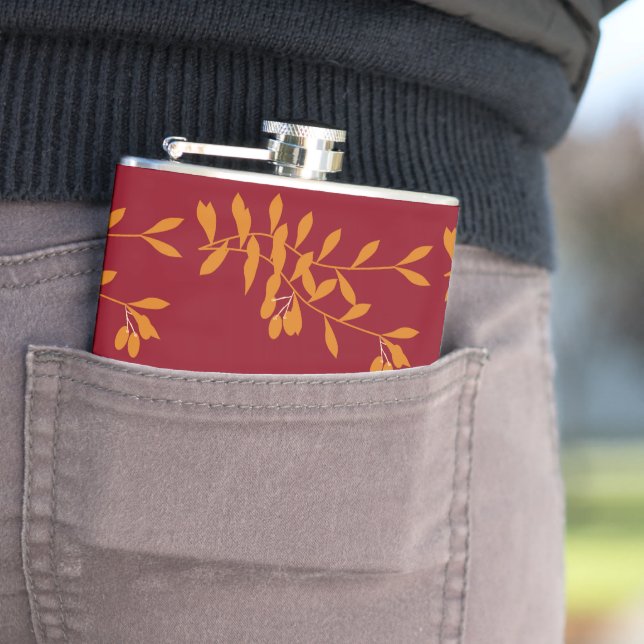 Petaca hojas de la rama de silueta naranja en rojo (In Situ)