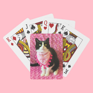 Pica las cartas de juego rosadas del gato de Tuxed