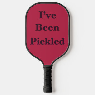 Pickleball He sido picado con palas de bolas de magenta