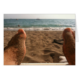 Pies de arena en la playa