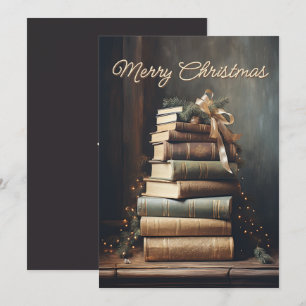 Pila de libros viejos con decoraciones de Navidad