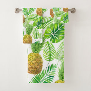 Piñas y hojas tropicales