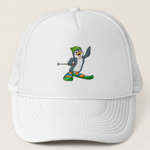 Pingüino como esquiador con pista de esquí y gorro