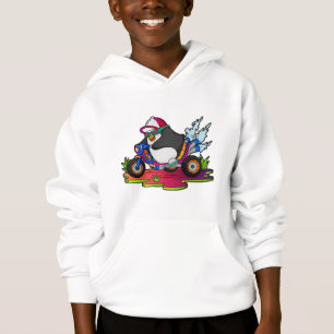 Pingüino como motociclista