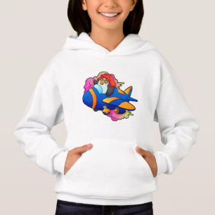 Pingüino como piloto con avión