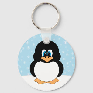 Pingüino con llavero de los copos de nieve