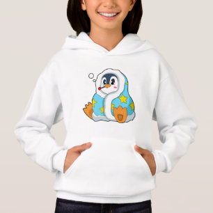 Pingüino con termómetro clínico