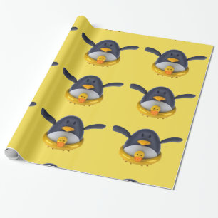 Pingüino con un papel de embalaje brillante del