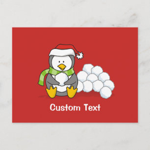 Pingüino navidad sentado con bolas de nieve