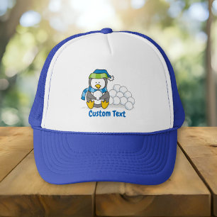 Pingüino pequeño sentado con sombrero de camionera