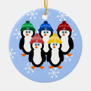 Pingüinos en el ornamento del árbol de navidad d