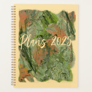 Pintura acrílica fluida en un planificador