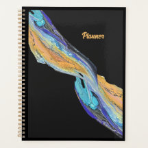 Pintura acrílica fluida hecha en un planificador