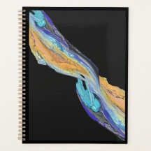 Pintura acrílica fluida hecha en un planificador