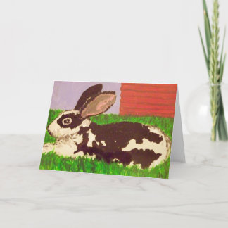 Pintura negra y blanca del conejito en tarjeta de