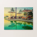 Piscina en el rompecabezas del rompecabezas del at<br><div class="desc">Rompecabezas de piscina,  tumbonas y sombrillas al atardecer. Revídelo cuando haya terminado o colóquelo para que funcione de nuevo. Elija entre los diferentes tamaños disponibles para seleccionar un tamaño mayor o menor o más piezas.</div>