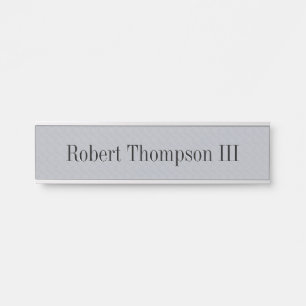 Placa de identificación gris de la puerta del