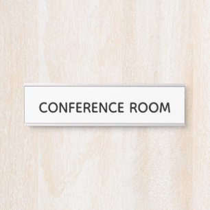 Placa de la puerta de la "sala de conferencias"