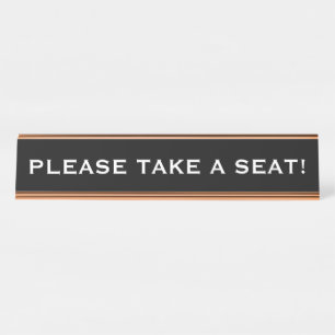 PLACA DE NOMBRE "¡POR FAVOR, TOME UN ASIENTO!"
