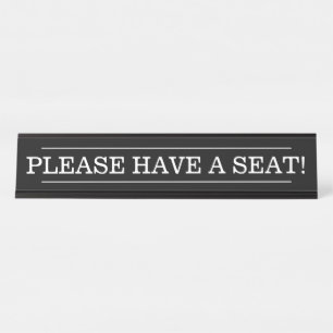 PLACA DE NOMBRE "¡POR FAVOR, TOME UN ASIENTO!"