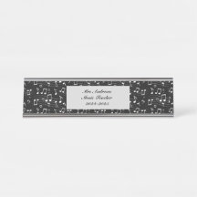 White music notes on black background