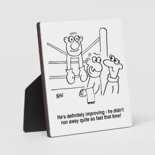 Placa Expositora Boxer en el anillo de boxeo. Divertido