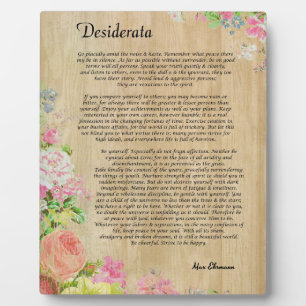 Placa Expositora Desiderata sobre el panel de madera rústica con re