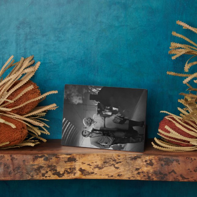 Placa Expositora Diciendo adiós (Lado)