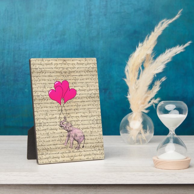Placa Expositora Elefante rosa sosteniendo globos (Lado)
