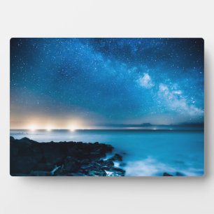 Placa Expositora Galaxia Vía Láctea sobre barcos pesqueros