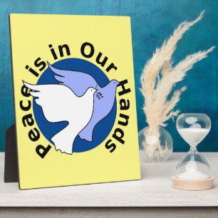 PLACA EXPOSITORA LA PAZ ESTÁ EN NUESTRAS MANOS