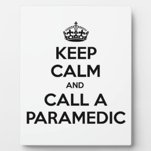 Placa Expositora Mantener la calma y llamar a un paramédico