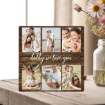 Placa Expositora Papá de la familia - Collage de fotos de la madera<br><div class="desc">Celebra a tu padre con el Collage de fotos Plaque del Día del Padre "Mejor Papá Nunca", un sincero homenaje al hombre que significa el mundo para ti. Esta placa de excelente fabricación presenta un collage de fotos de personalizable de alta calidad, que le permite mostrar recuerdos y momentos especiales....</div>