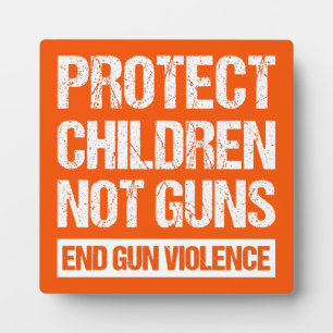 Placa Expositora Proteger a los niños, no las armas - Terminar con