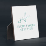 Placa Expositora Rótulo de contraseña mínima de Wi-Fi<br><div class="desc">Mantén a tus huéspedes conectados con este elegante Rótulo Minimal WiFi Password. Esta placa presenta un diseño sencillo y moderno con un elegante tipo de letra turquesa sobre un fondo blanco y limpio. Es perfecto para mostrar tu contraseña WiFi de una manera funcional y decorativa. El tamaño de 5, 25x5,...</div>